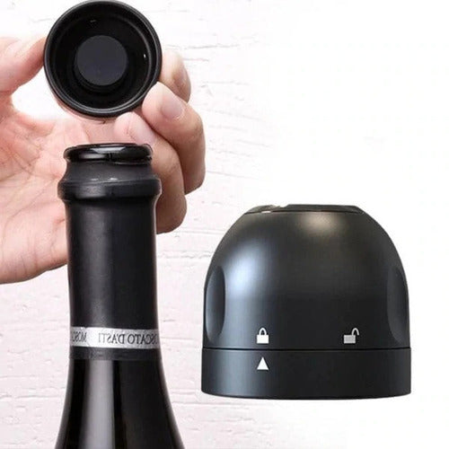 Image of two silicone wine stoppers. The stoppers are designed to provide an air-tight seal for wine bottles. Made of durable silicone, they are suitable for red and white wine bottles. The stoppers feature a twist-to-seal design and four steel balls inside for a secure grip on the bottle neck. The design is simple and functional, ideal for preserving wine freshness.